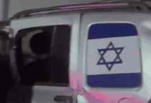 سيارة تضع علم اسرائيل في كرداسة